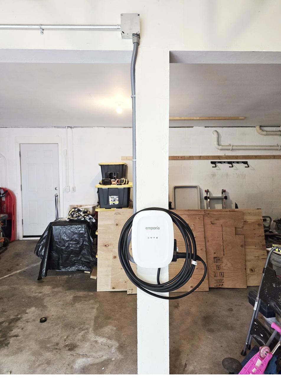 Finished Emporia EV charger mounted on post in Park Forest, State College garage