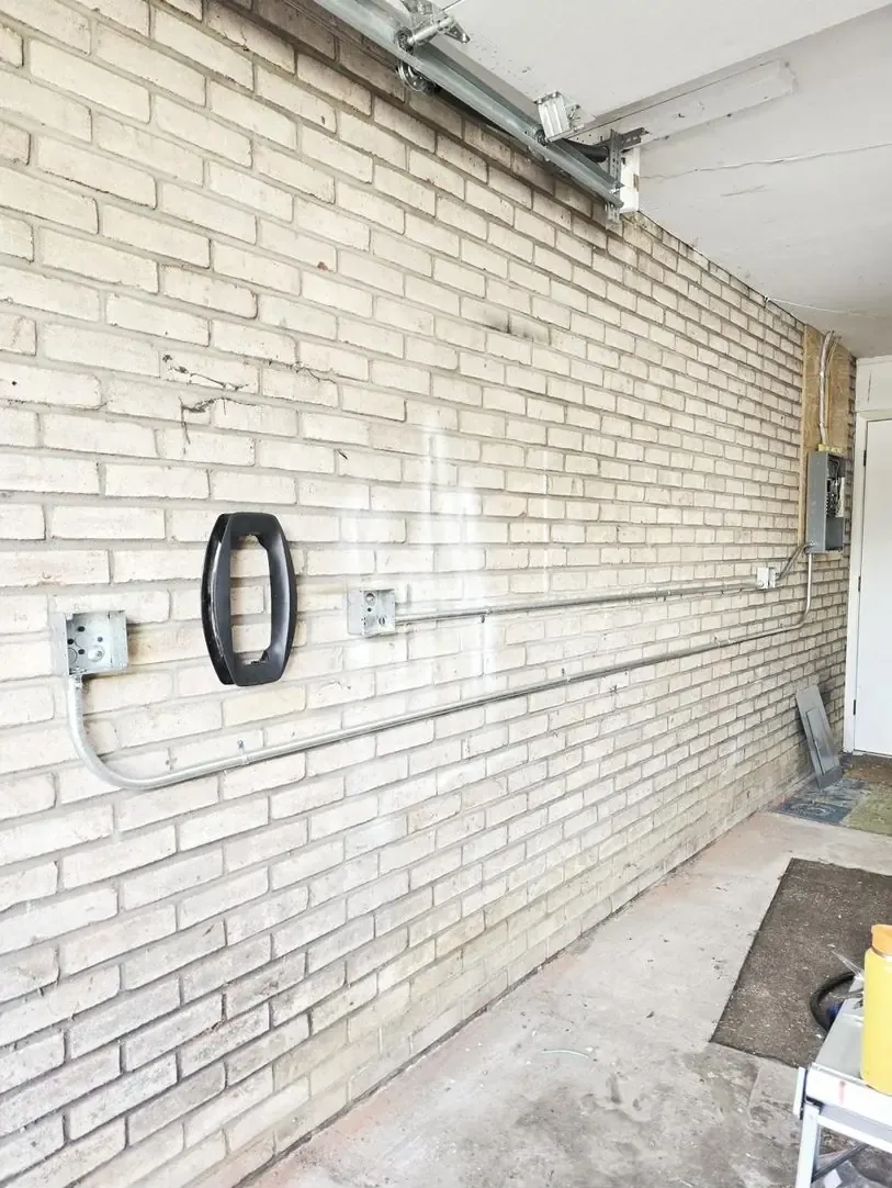 EMT conduit run from sub-panel to NEMA 14-50 outlet in State College PA garage