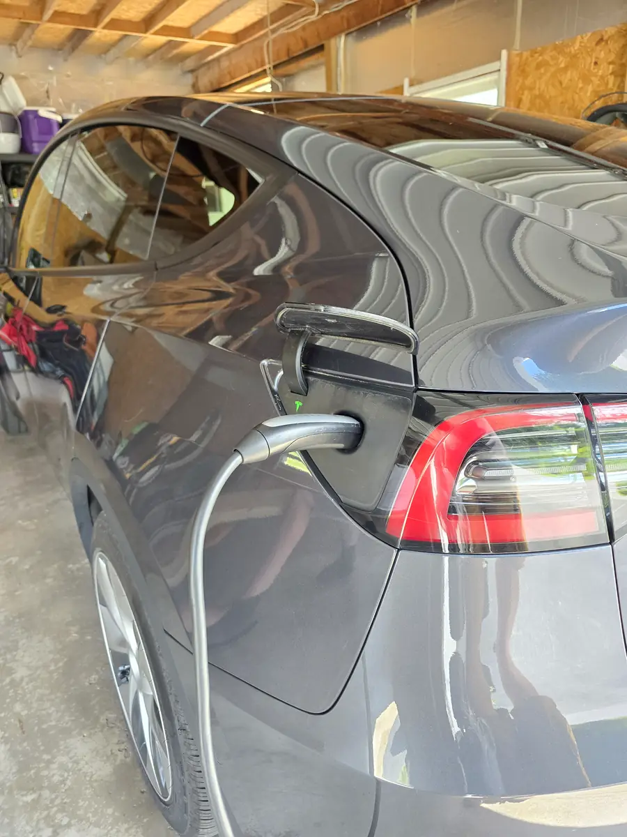 Tesla Model Y charging with the Tesla Mobile Connector in Hawk Run, PA