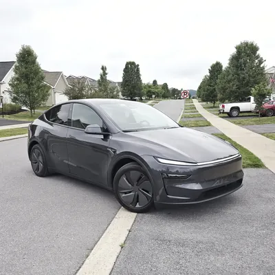 New Tesla Model Y outside a Bellefonte home before its Tesla Wall Connector install · Steel Fox EV & Electric, Central PA