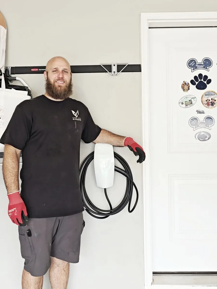 Todd of Steel Fox EV & Electric with the completed Tesla Wall Connector install in Bellefonte