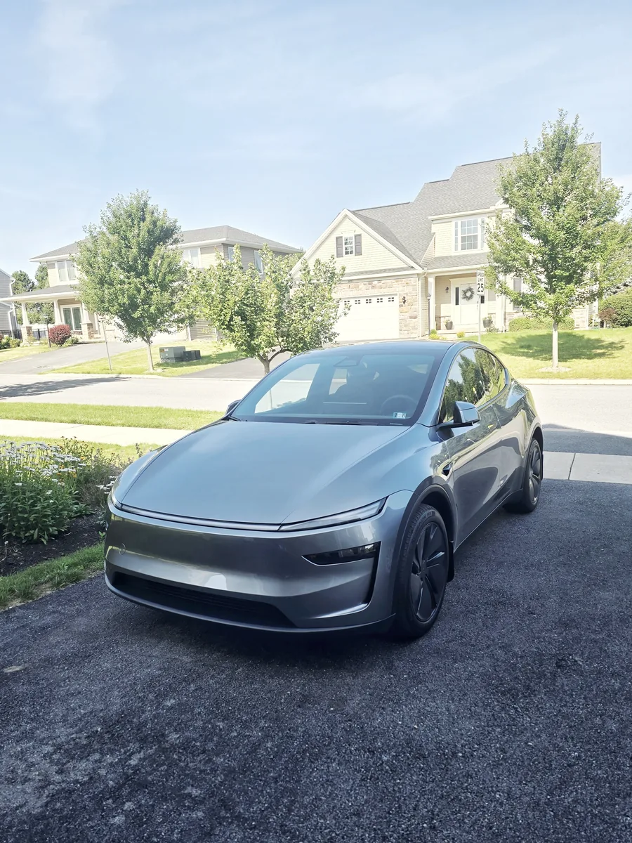 Brand new Tesla Model Y in the driveway of a Boalsburg, PA home before its Tesla Wall Connector installation