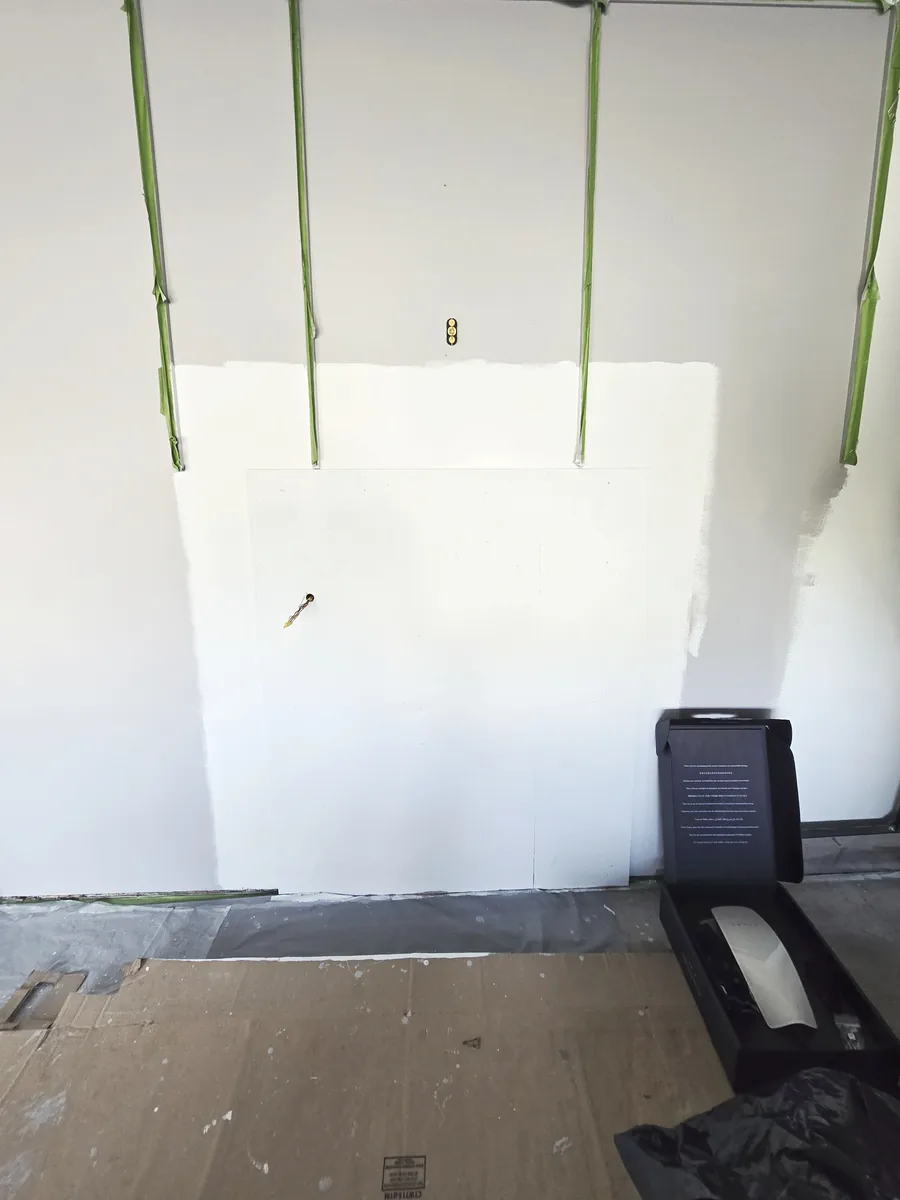 Boalsburg garage wall prepped and taped before the Tesla Wall Connector installation