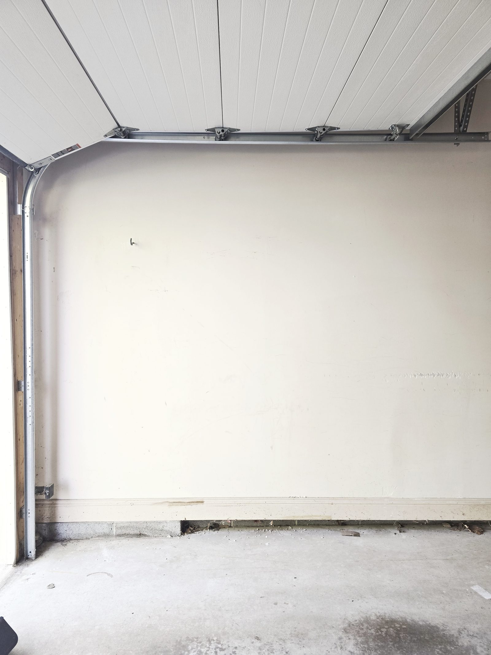 Garage wall before Tesla Wall Connector install in Grays Woods