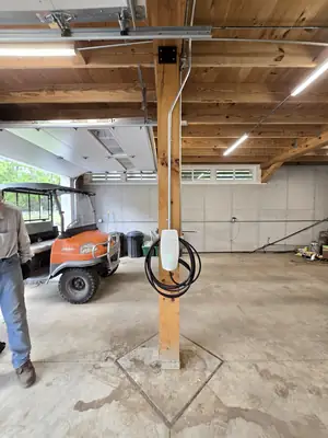 Finished Tesla Wall Connector powered on in a Tyrone detached garage · Steel Fox EV & Electric, Central PA